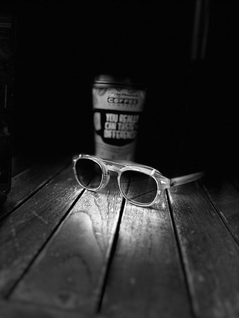Coffee Cup and Sunglasses
